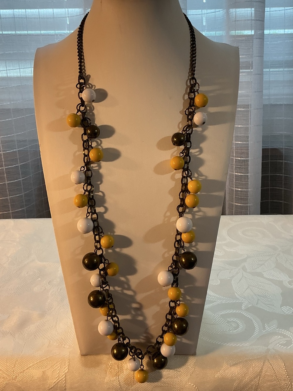 Yellow & White Waterfall Bead Cluster Dark Antique Brass Necklace